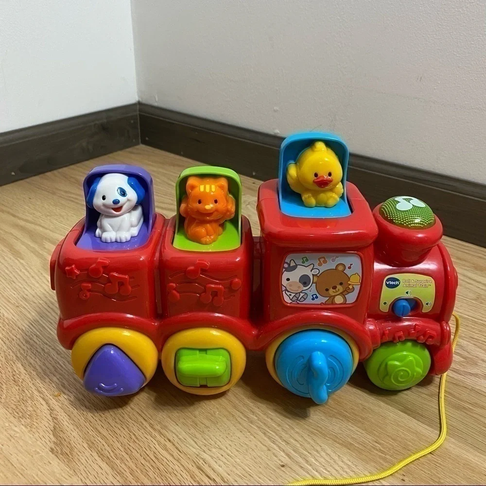 V-tech Roll & Surprise Animal Train Pop Up Music